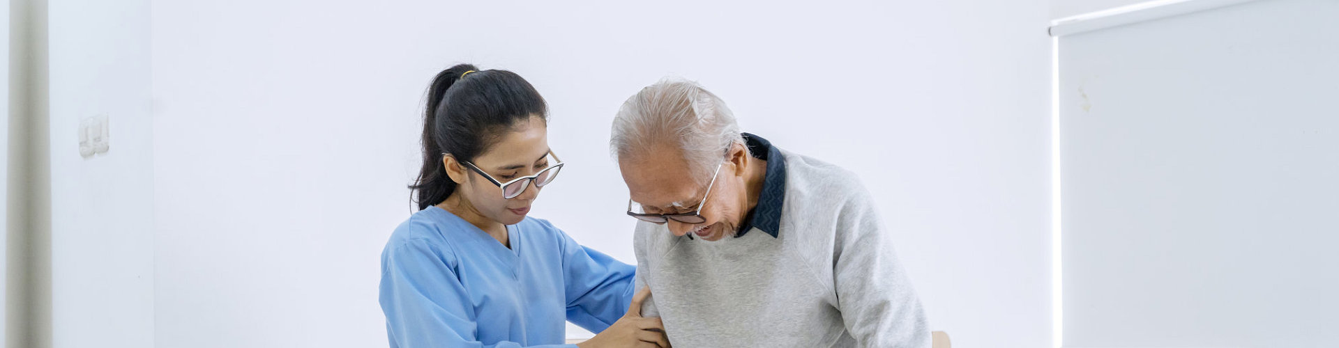 caregiver assisting to her patient